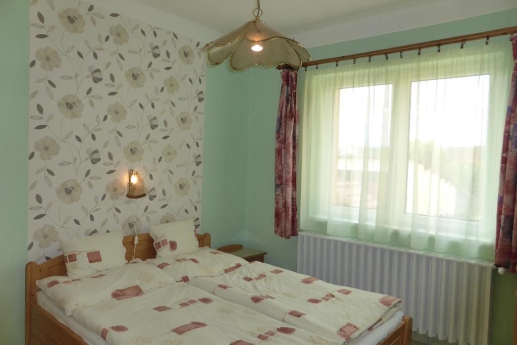 Napfeny Apartman Es Vendeghaz إيغيرسولوك الغرفة الصورة